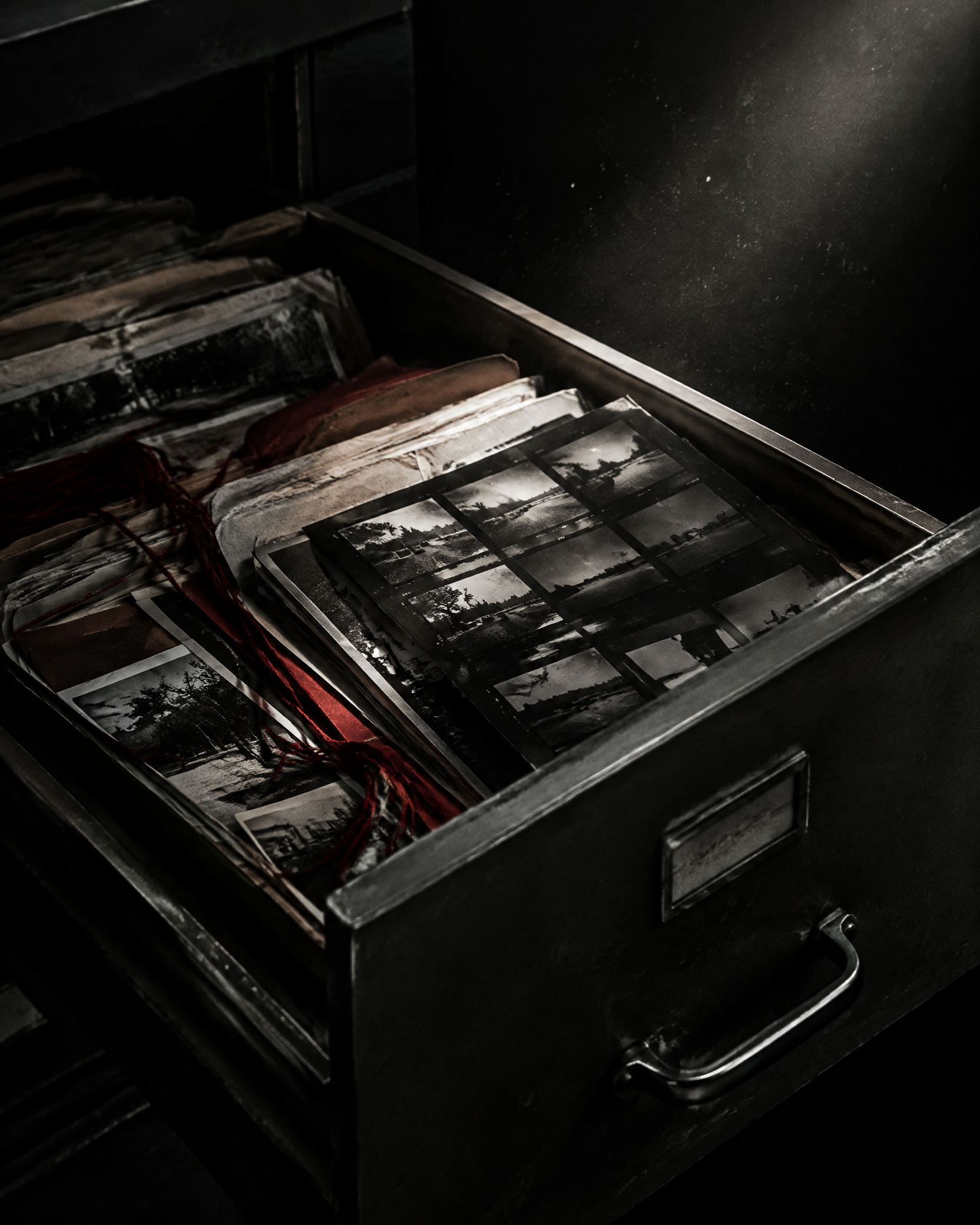 An archive drawer holding case photographs